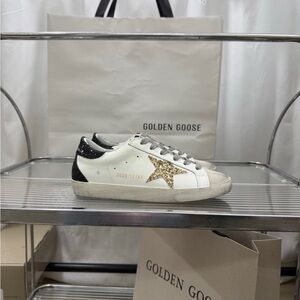 Golden Goose White Sneakers with Gold Star and Black Glitter Heel